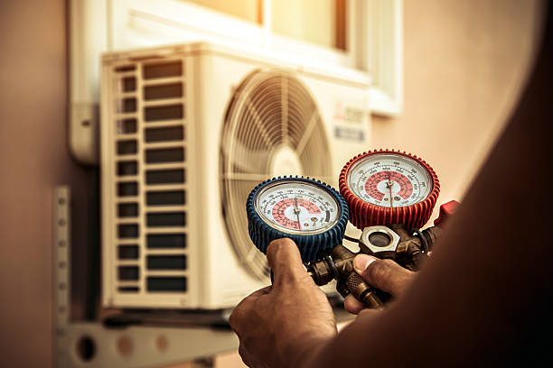Professional Ductwork Repair technician working in Hopedale, MA